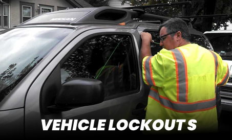 photo of locksmith providing vehicle lockout service